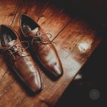 Why is putting shoes on a table bad luck? Discover the disturbing British superstition linking shoes, death, funerals, and household misfortune.