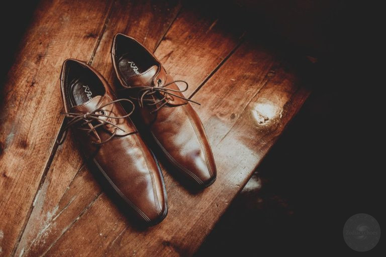 Why is putting shoes on a table bad luck? Discover the disturbing British superstition linking shoes, death, funerals, and household misfortune.